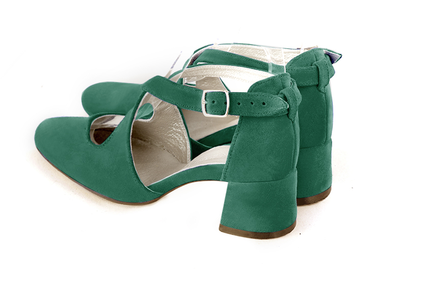 Women's emerald green elegant closed-back heels, with crossed straps. .  - Rear view